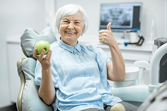 Day-to-day benefits of dental implants include the ability to once again enjoy your favorite foods